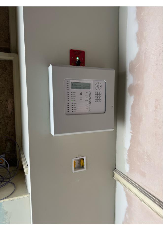 Fire alarm control panel installed in a building undergoing refurbishment